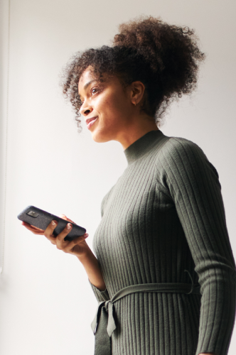 woman holding a phone